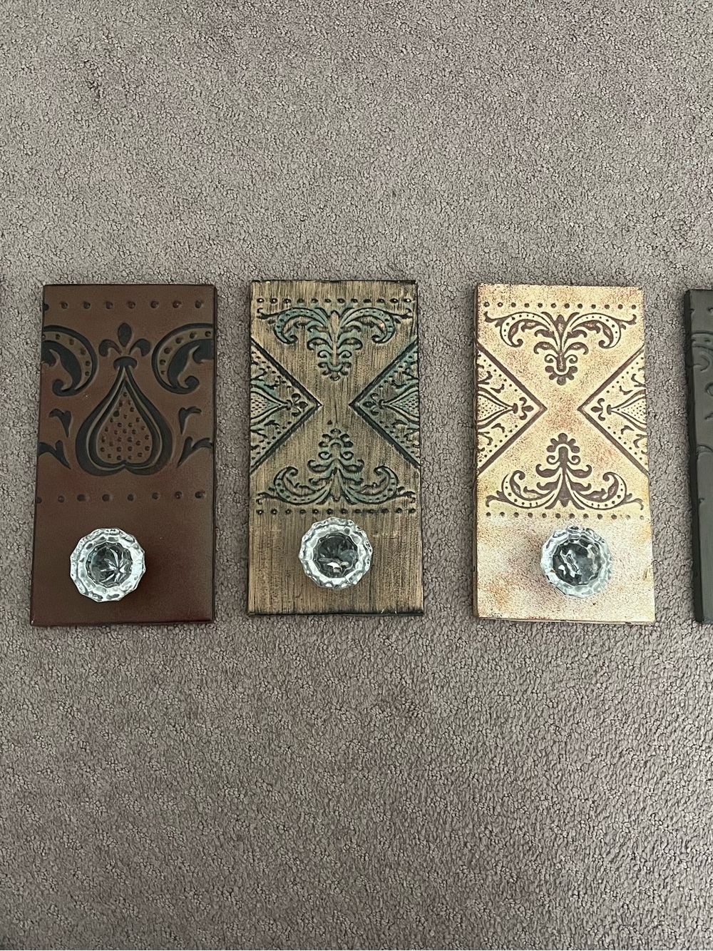 Metal wall hooks with glass like door knob handle